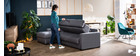 Canap&eacute; d'angle r&eacute;versible et convertible avec coffre et t&ecirc;ti&egrave;res ajustables gris NORO