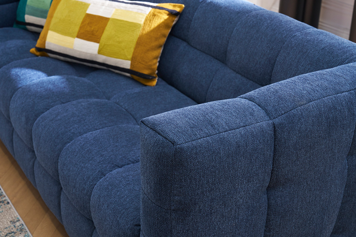 Canap design 3 places et repose-pieds en tissu effet velours textur bleu fonc CORTO